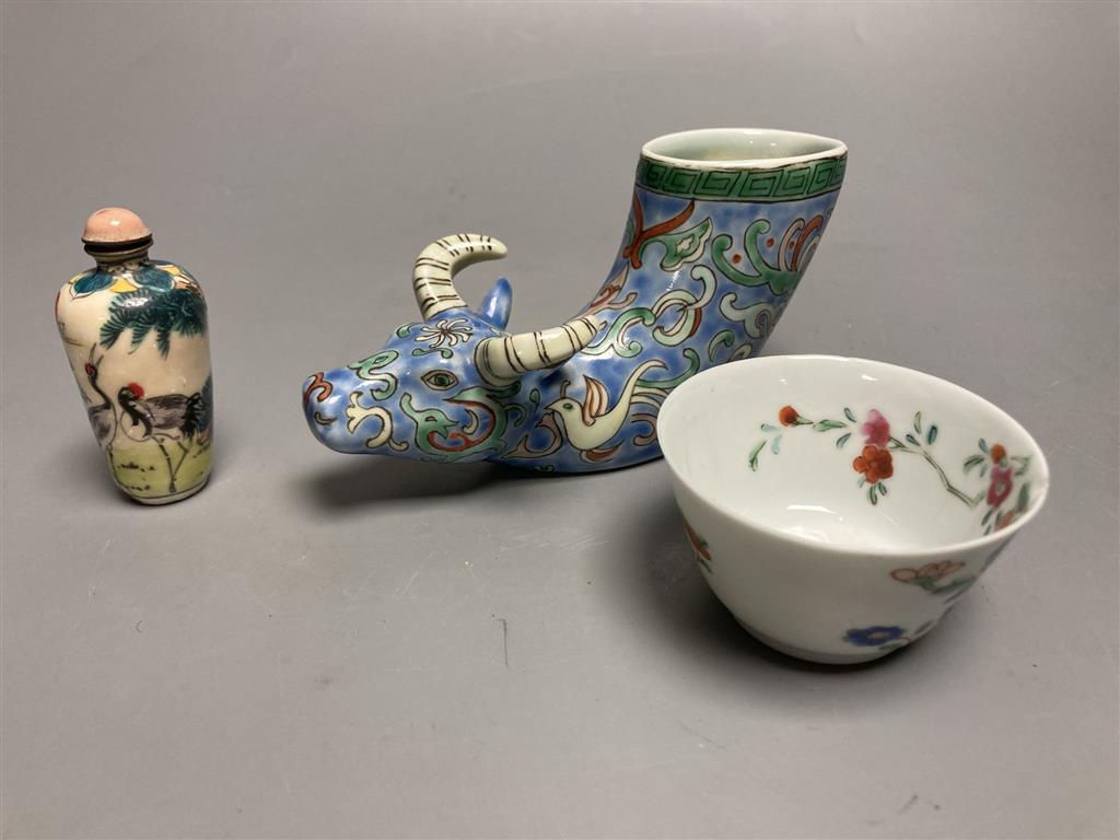 A Chinese famille rose cup, an ox rhyton cup and an enamel on copper snuff bottle